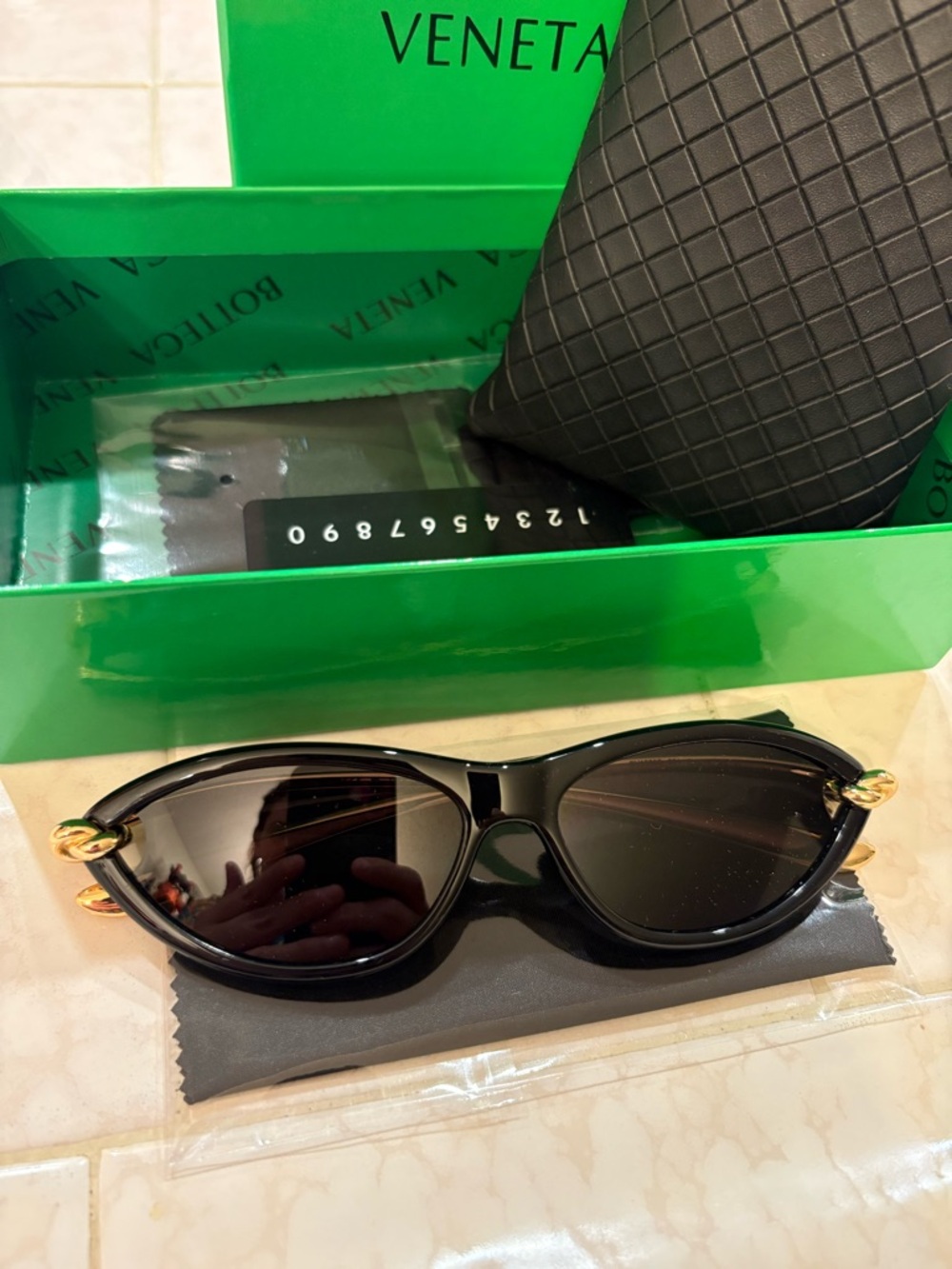 Bottega Veneta Black and Gold Oval Sunglasses